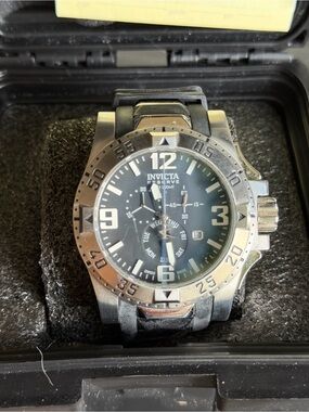 Invicta Silver and Black Watch Buckle with Yellow Tag